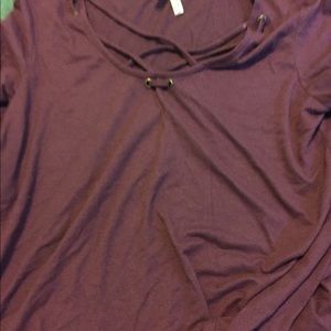 Long sleeve maroon shirt.